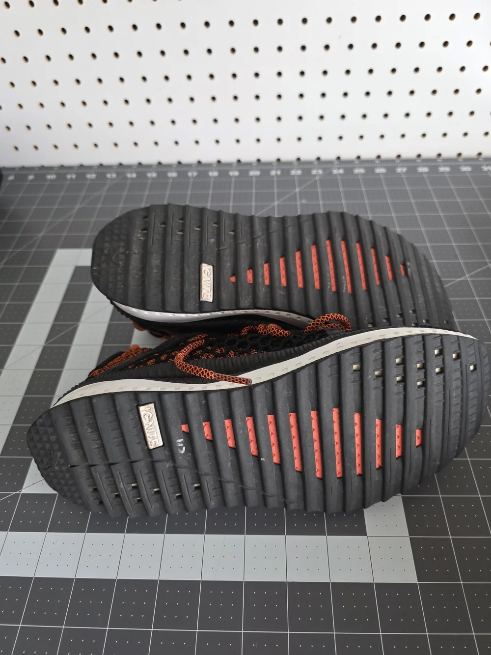 Puma Black Knit Sneakers with Orange Accents